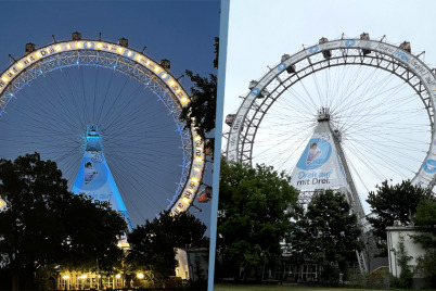 Die Werbehelden lassen das Riesenrad im Drei Österreich Branding erstrahlen